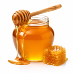 Raw organic honey in a glass jar